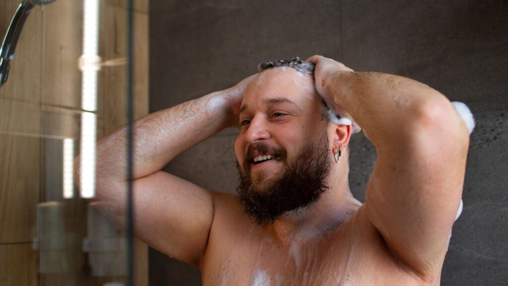 Can you shower with a hair system? A man is doing that showing it's absolutely fine.