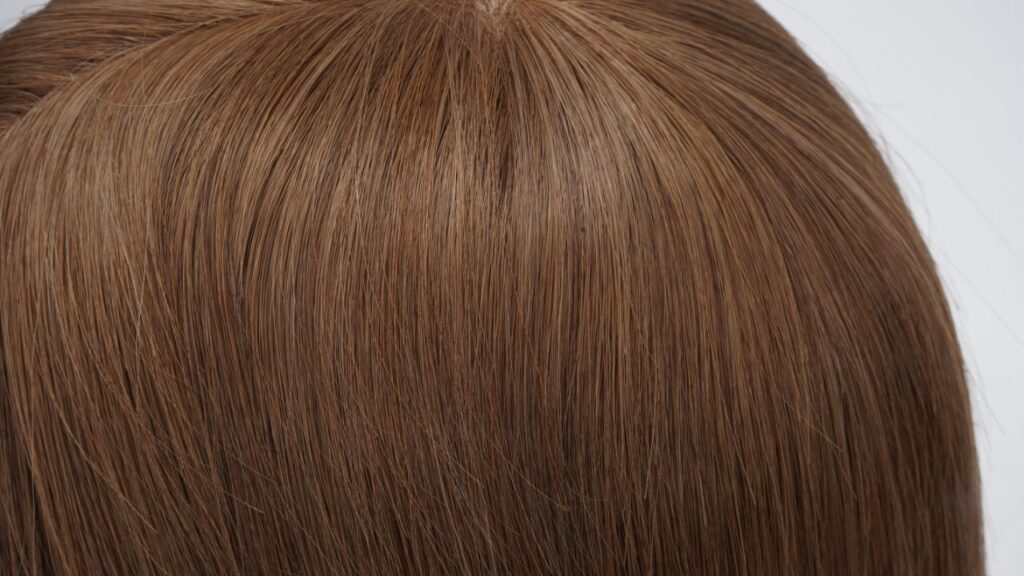 The hair of a human hair wig