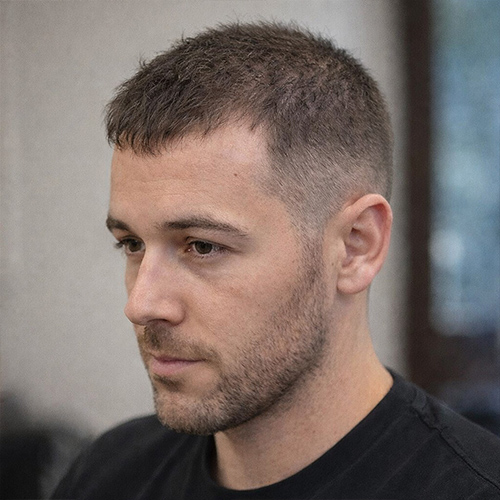 a guy with a butch cut, a good hairstyle for receding hairline