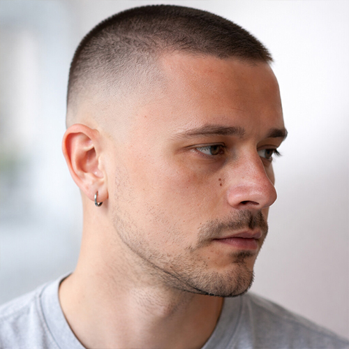 guy with a close cut for receding hairline