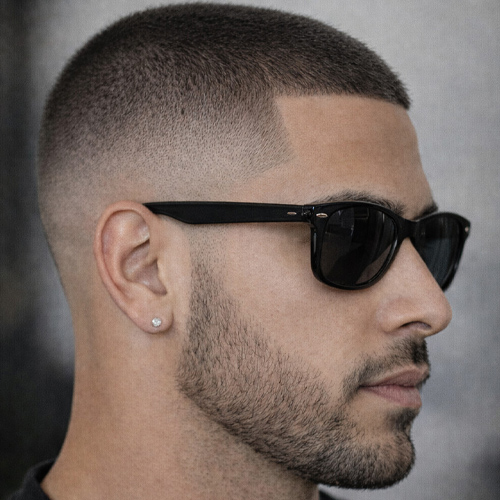 a guy with beard fade with short buzz