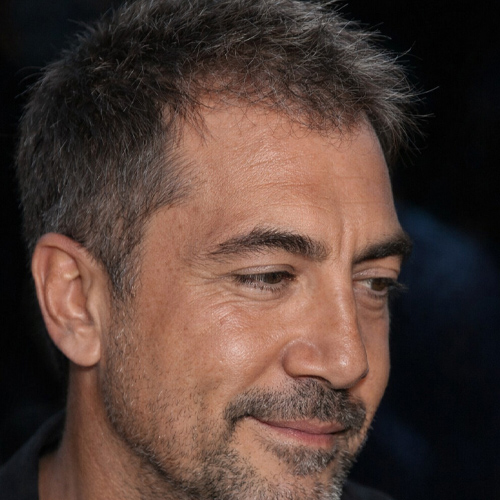 a man with laeyred short cut