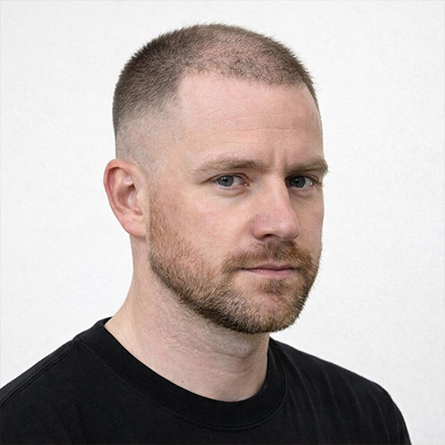 a man with short crew cut