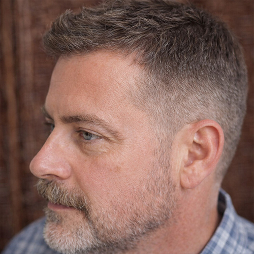 Guy with short scissor cut