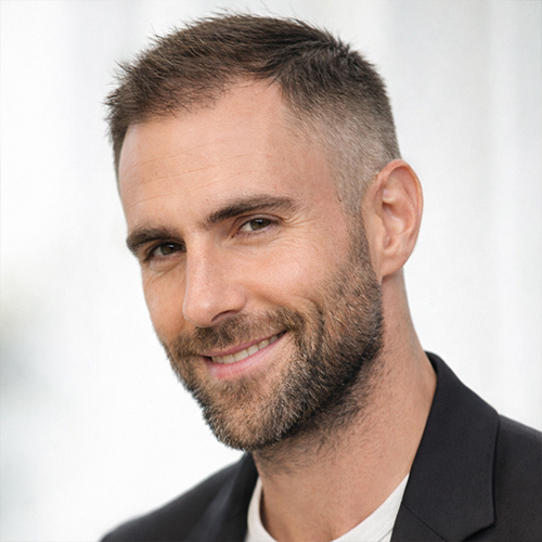 a man with a short side fade hairstyle