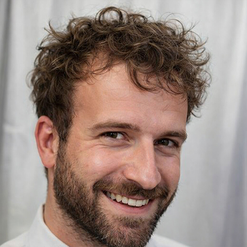 a guy with touseled shag haircut