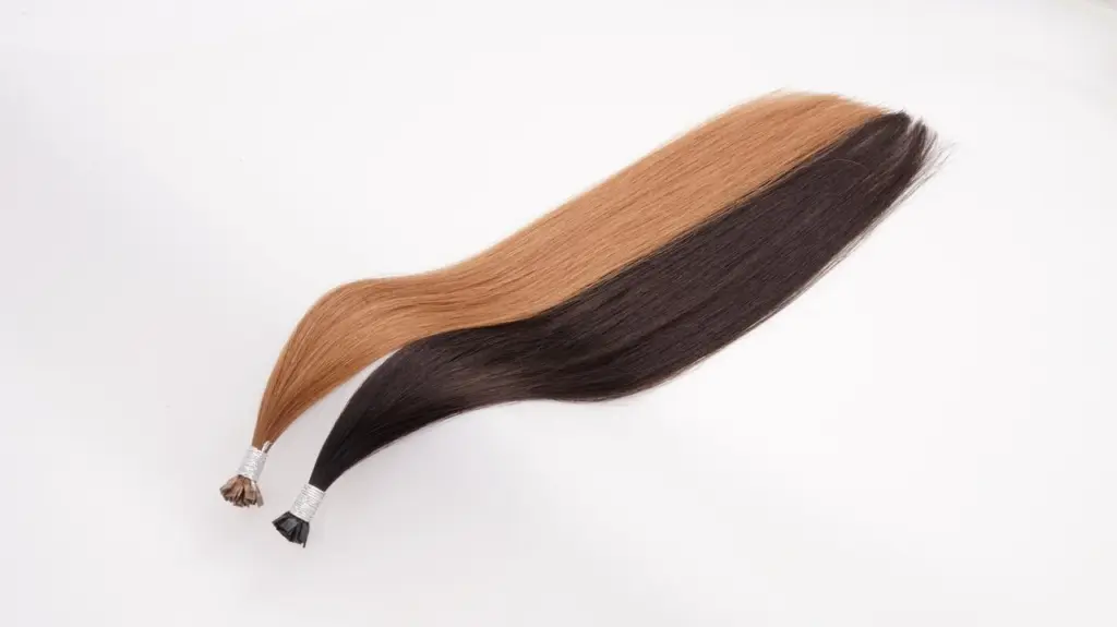 Flat-Tip Remy human hair extensions in warm brown and dark brown shades, shown as a Stage 3 differentiation product for salons offering precise, low-profile, comfortable extension services.